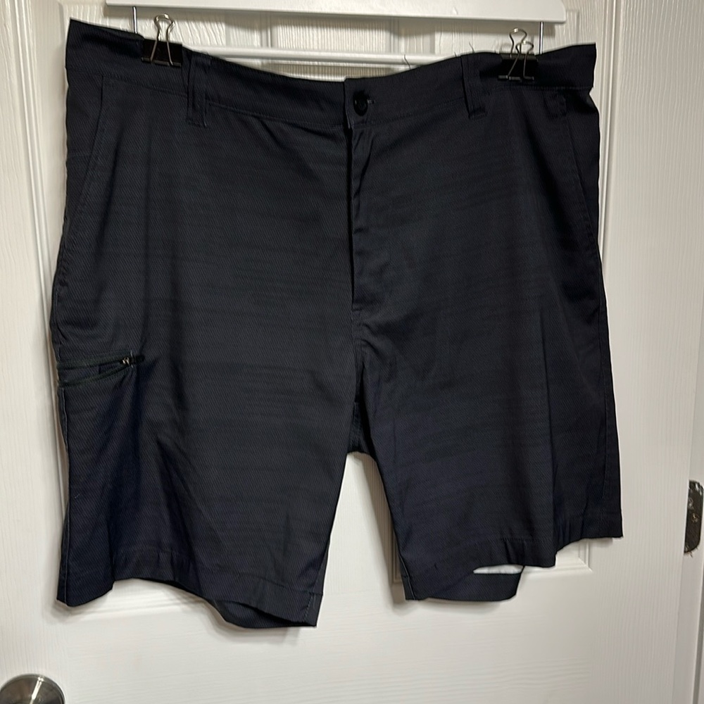 Men’s dri fit dark gray shorts.
